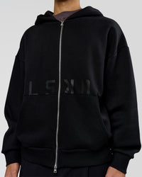 Man wearing Shadow Mode Oversized Zip Through Hoodie - Black | Model:Leandro | Size:M
