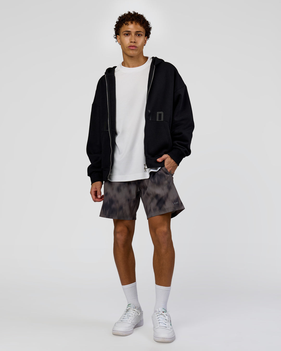 Man wearing Shadow Mode Oversized Zip Through Hoodie - Black | Model:Leandro | Size:M