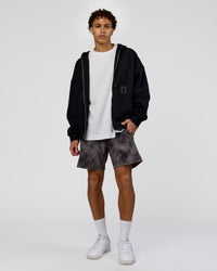 Man wearing Shadow Mode Oversized Zip Through Hoodie - Black | Model:Leandro | Size:M