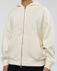 Man wearing Shadow Mode Oversized Zip Through Hoodie - Off White | Model:Leandro | Size:M
