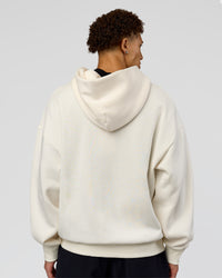 Man wearing Shadow Mode Oversized Zip Through Hoodie - Off White | Model:Leandro | Size:M