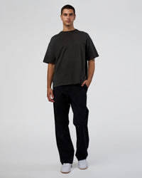 Man wearing Spray Heavyweight Unisex Oversized Tee - Charcoal Washed | Model:Zoran | Size:M