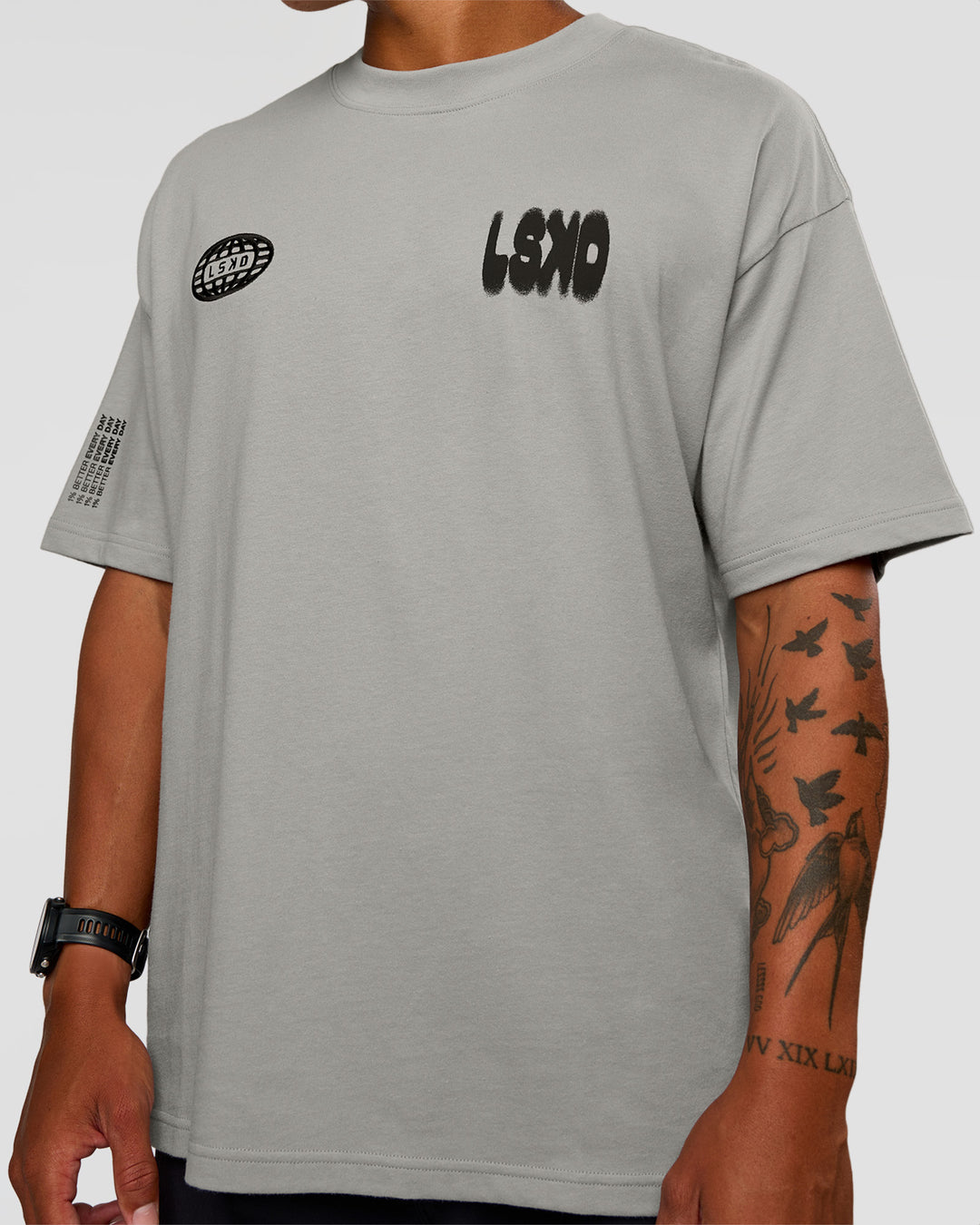 Man wearing Static Grit Heavyweight Oversized Tee - Alloy-Black | Model:Malebo | Size:M