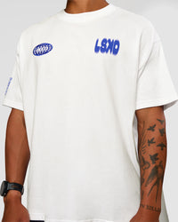 Man wearing Static Grit Heavyweight Oversized Tee - White-Electric Indigo | Model:Malebo | Size:M