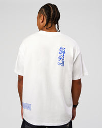 Man wearing Static Grit Heavyweight Oversized Tee - White-Electric Indigo | Model:Malebo | Size:M