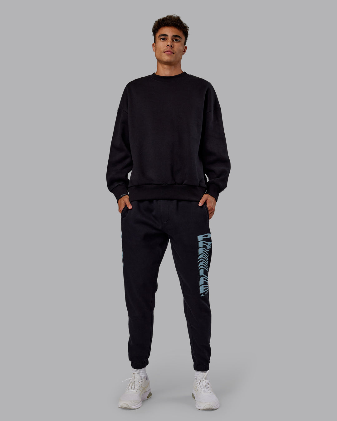 Man wearing Static Track Pant - Black-Skyride | Model:Jaxon | Size:M