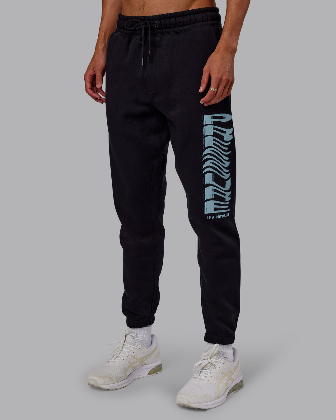Man wearing Static Track Pant - Black-Skyride | Model:Jaxon | Size:M