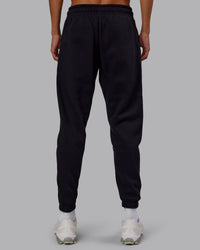 Man wearing Static Track Pant - Black-Skyride | Model:Jaxon | Size:M