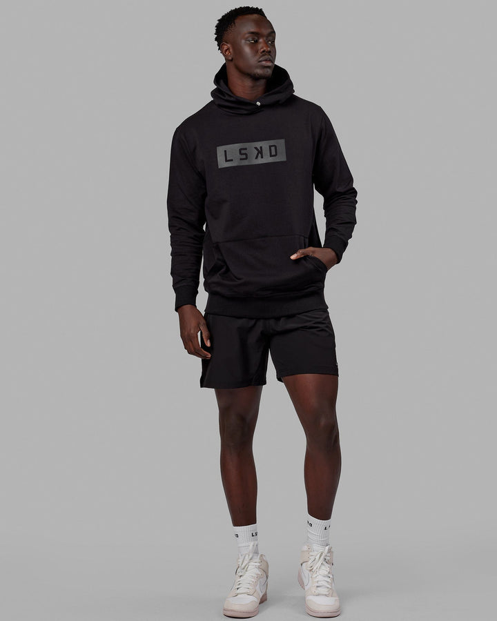 Man wearing Unisex Strength FLXFLeece Hoodie - Black-Black