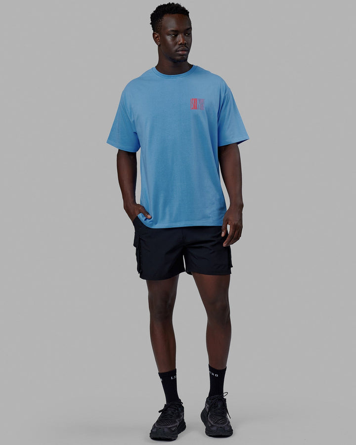 Man wearing Unisex Stretch It FLXCotton Tee Oversize - Azure Blue