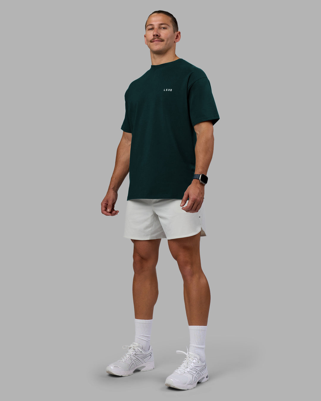 Man wearing Think Strong Heavyweight FLXCotton Tee Oversize - Dark Moss-Off White | Model:Jaiden | Size:M