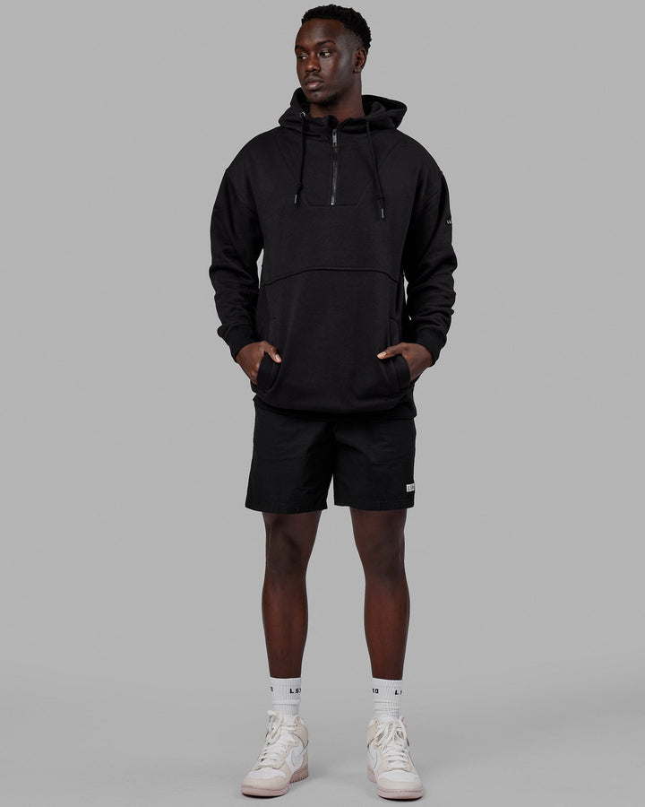 Man wearing Unisex Trek Hoodie Oversize - Black