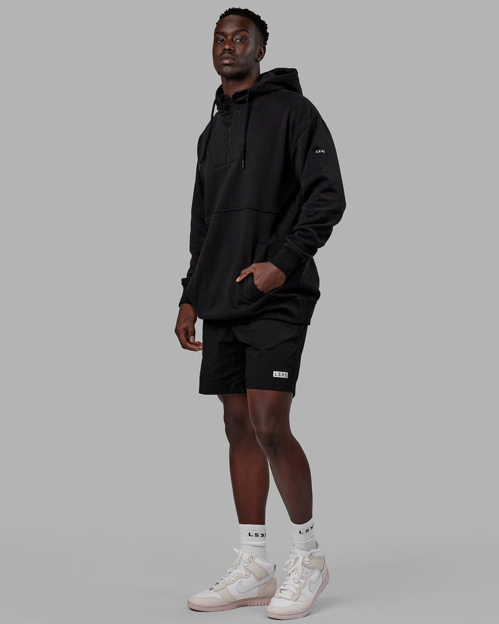 Man wearing Unisex Trek Hoodie Oversize - Black
