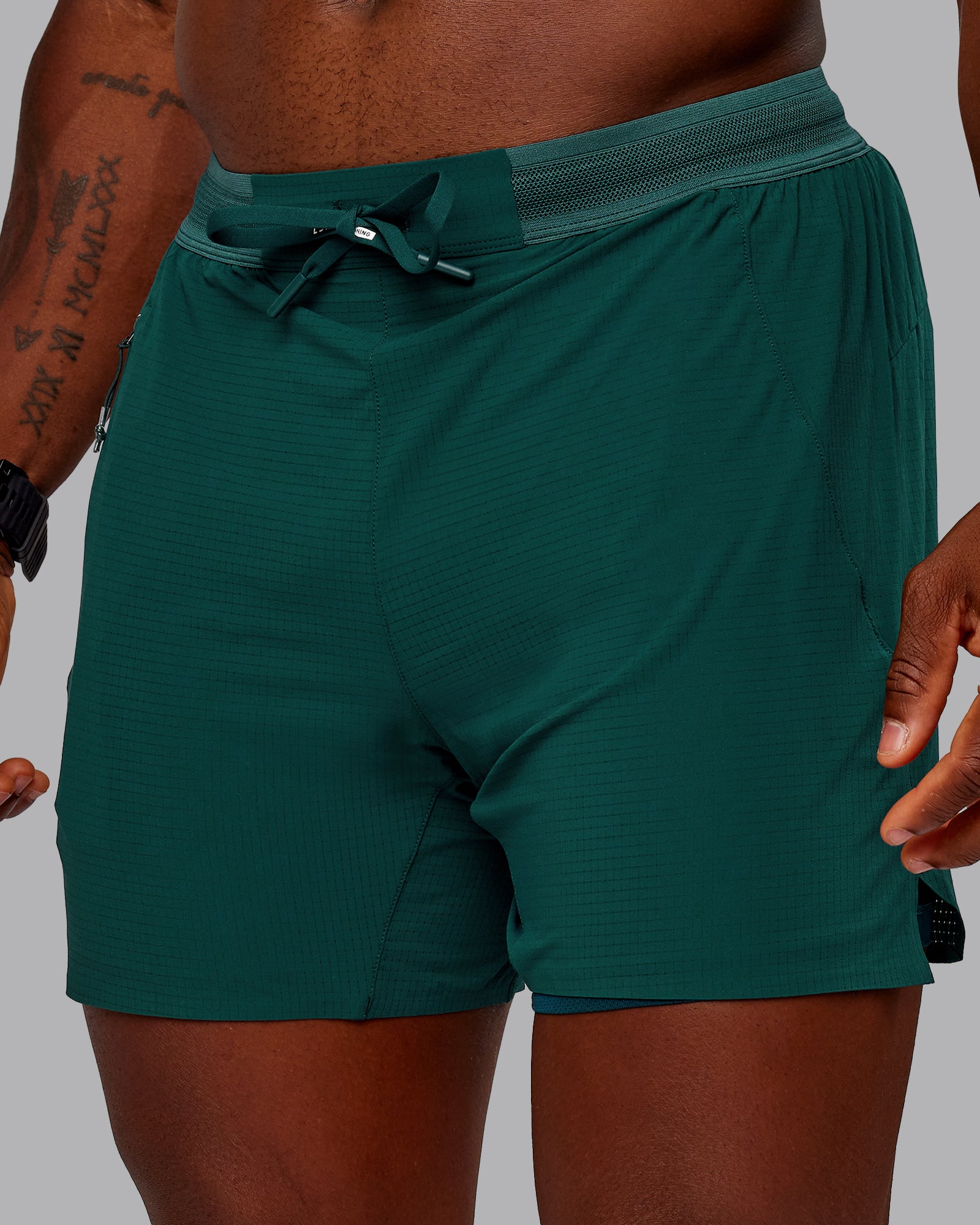 Man wearing UltraAir 5" Lined Performance Short in Dark Moss | Size:M