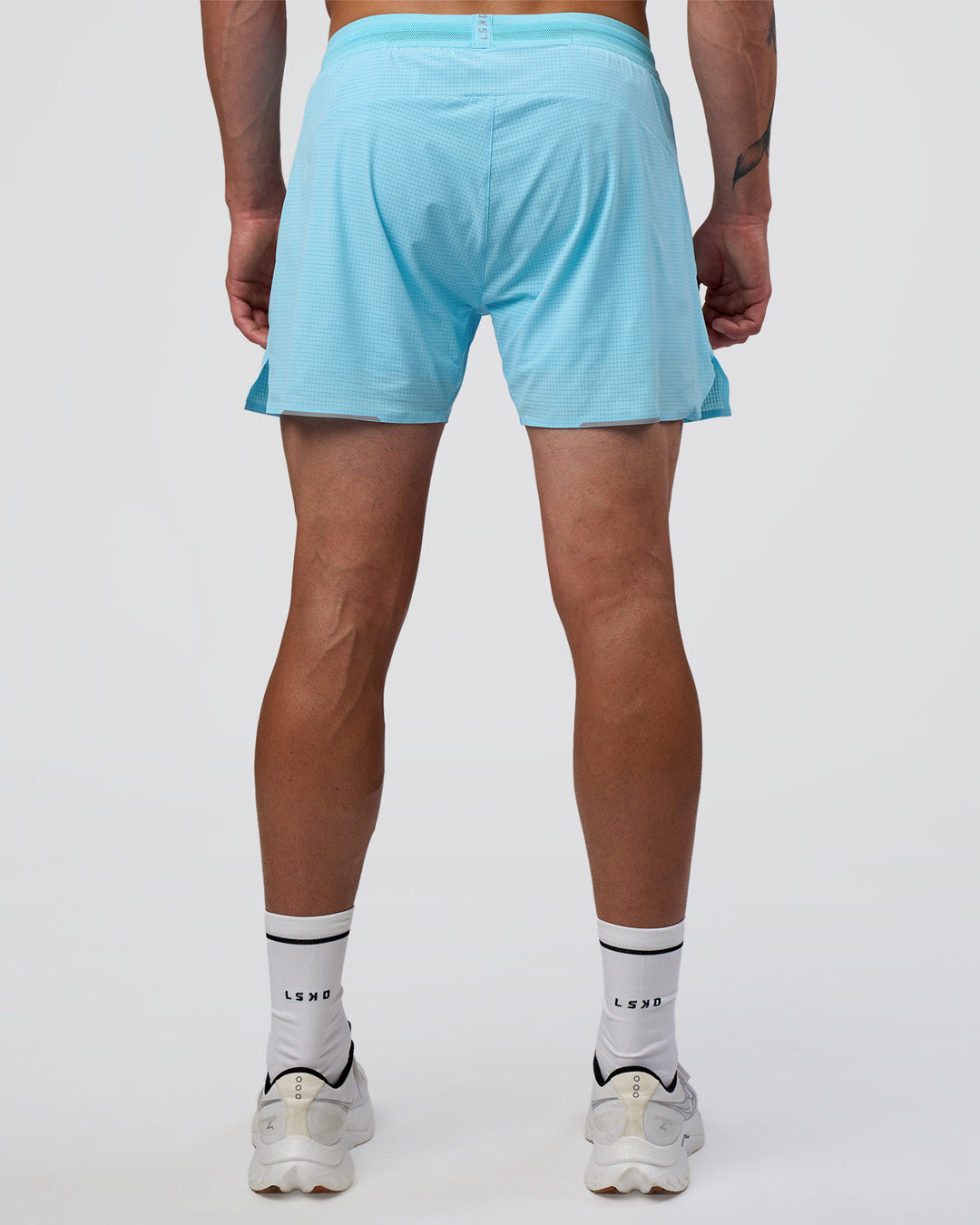 Man wearing UltraAir 5&quot; Lined Performance Short - Baltic Sea | Model:Konnor | Size:M