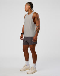 Man wearing UltraAir 5" Lined Performance Short - Duskstone | Model:Malebo | Size:M