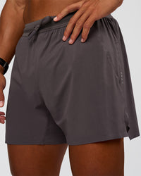 Man wearing UltraAir 5" Lined Performance Short - Duskstone | Model:Malebo | Size:M