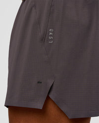 Man wearing UltraAir 5" Lined Performance Short - Duskstone | Model:Malebo | Size:M