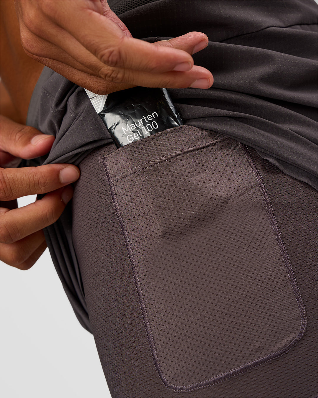 Man wearing UltraAir 5" Lined Performance Short - Duskstone | Model:Malebo | Size:M