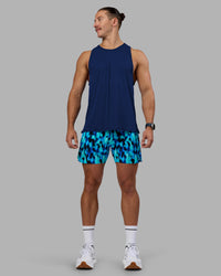 Man wearing UltraAir 5" Lined Performance Short - Luminous | Model:Jaiden | Size:M