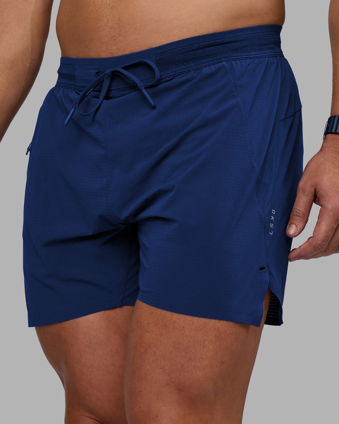 Man wearing UltraAir 5" Lined Performance Short - Midnight Blue | Model:Jaiden | Size:M