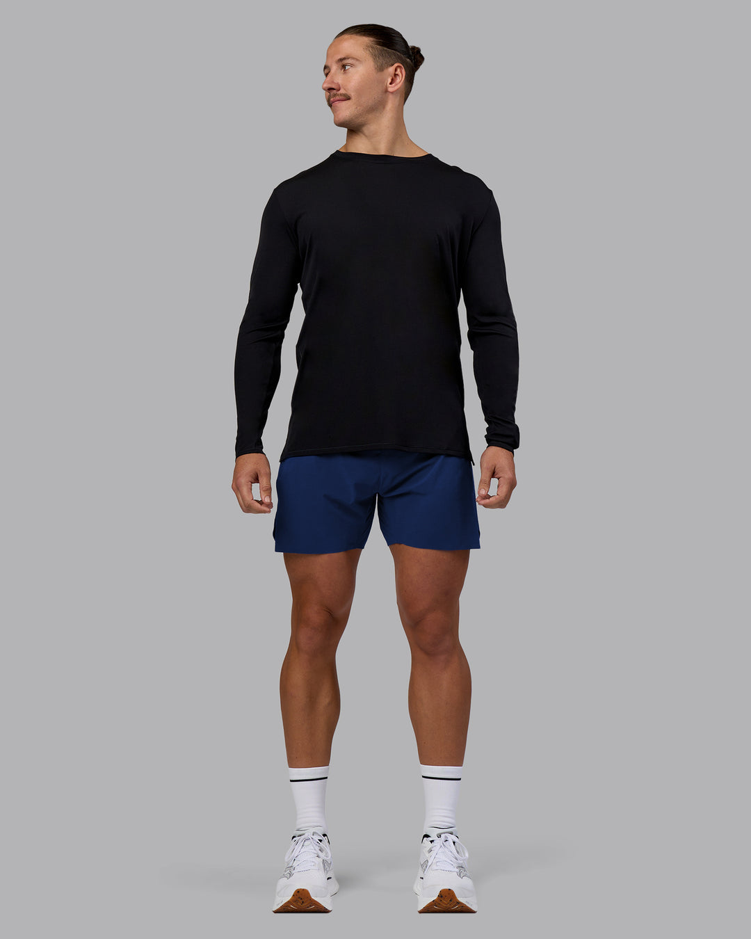 Man wearing UltraAir 5" Lined Performance Short - Midnight Blue | Model:Jaiden | Size:M