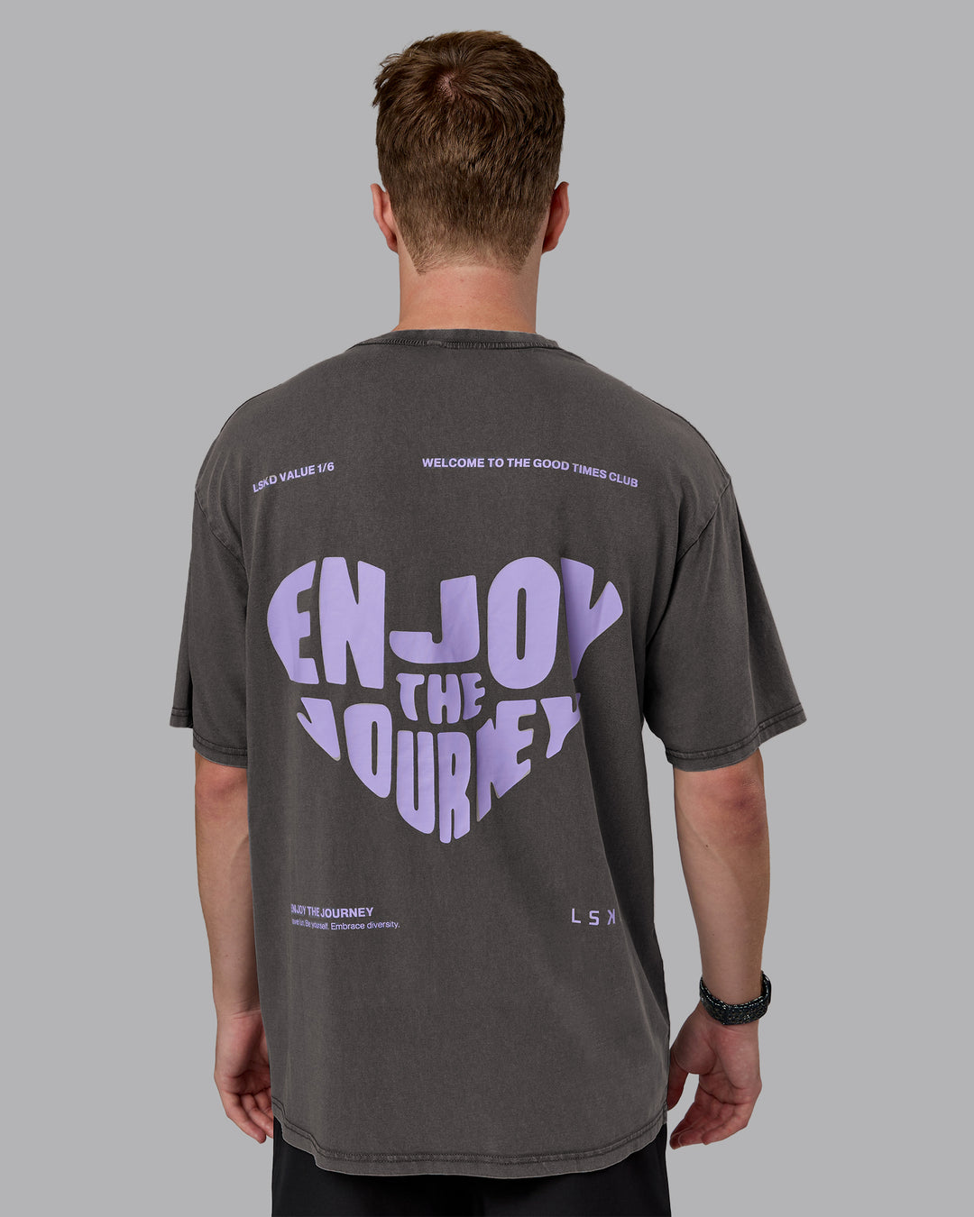 Man wearing Heart FLXCotton Oversized Tee - Washed Dark Storm-Violet Ray | Model:Cameron | Size:M