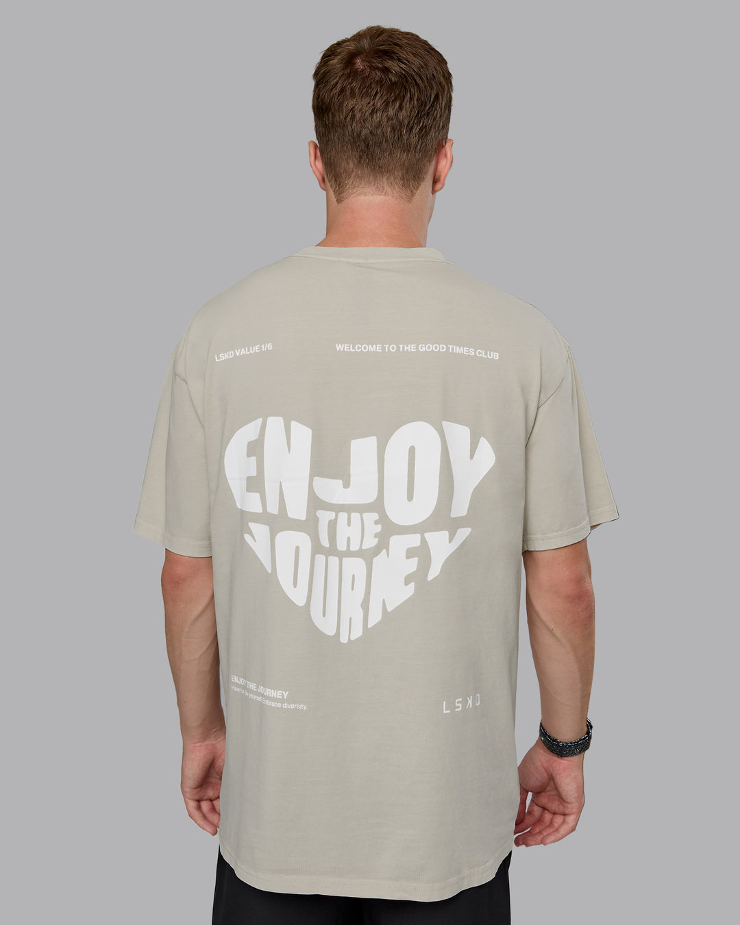 Man wearing Heart FLXCotton Oversized Tee - Washed Shale Beige-White | Model:Cameron | Size:M
