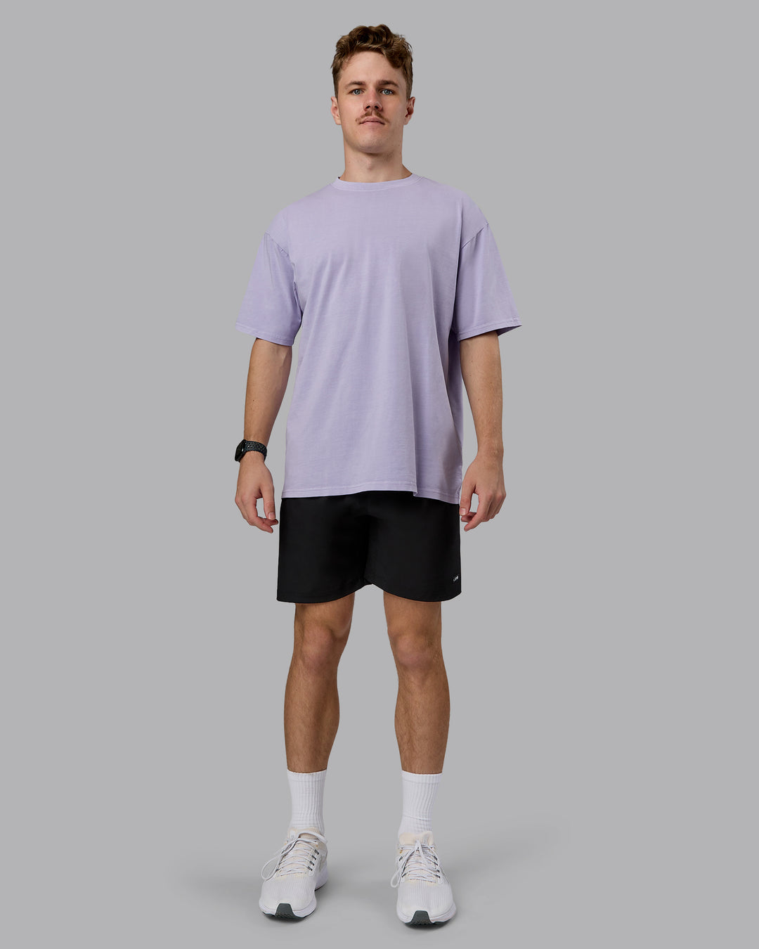 Man wearing Heart FLXCotton Oversized Tee - Washed Violet Ray-White | Model:Cameron | Size:M