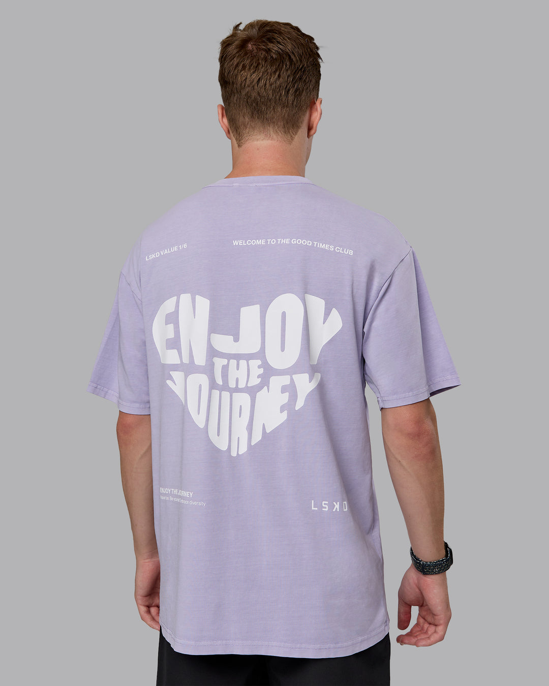 Man wearing Heart FLXCotton Oversized Tee - Washed Violet Ray-White | Model:Cameron | Size:M