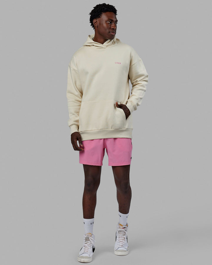 Man wearing Unisex Lift-Up Hoodie Oversize - Warm White