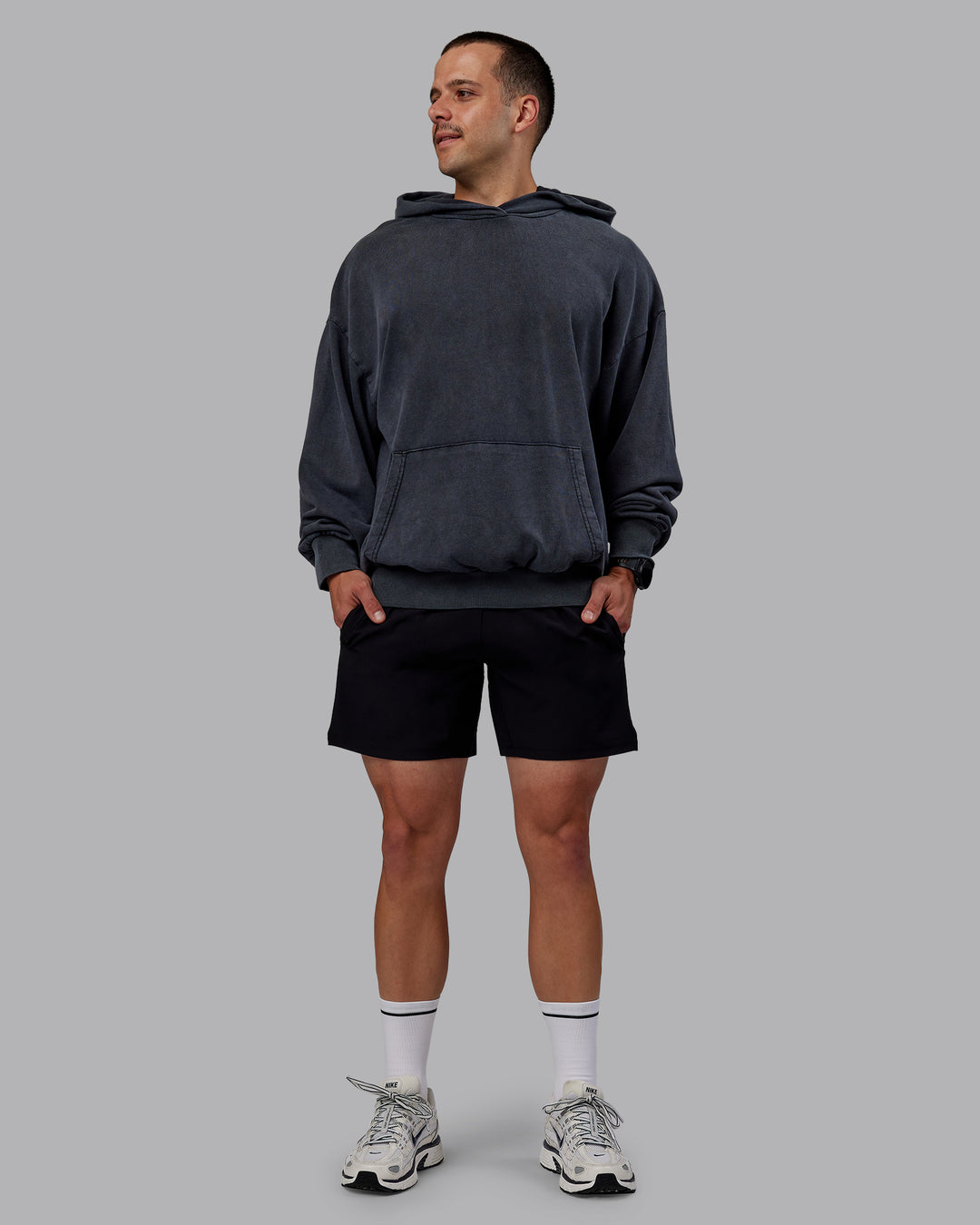 Man wearing Set the Standard Washed Oversized Hoodie in Black-Black | Size:M