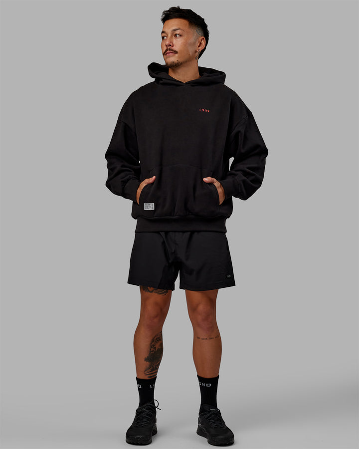 Man wearing Unisex VS6 Hoodie Oversize - Black-Scarlet