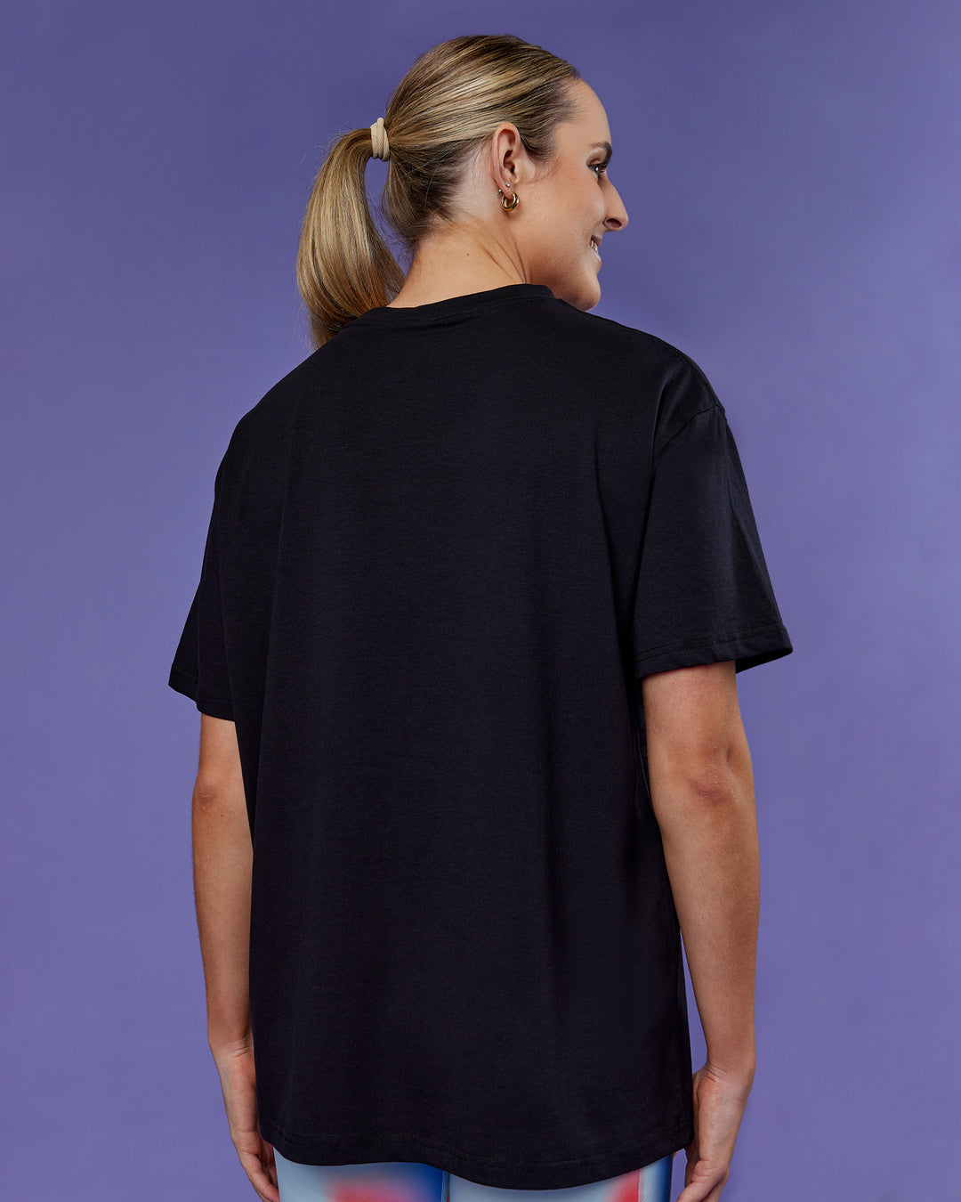 Woman wearing Unity Go-To FLX Cotton Tee - Black-Rainbow | Model:Mon | Size:M