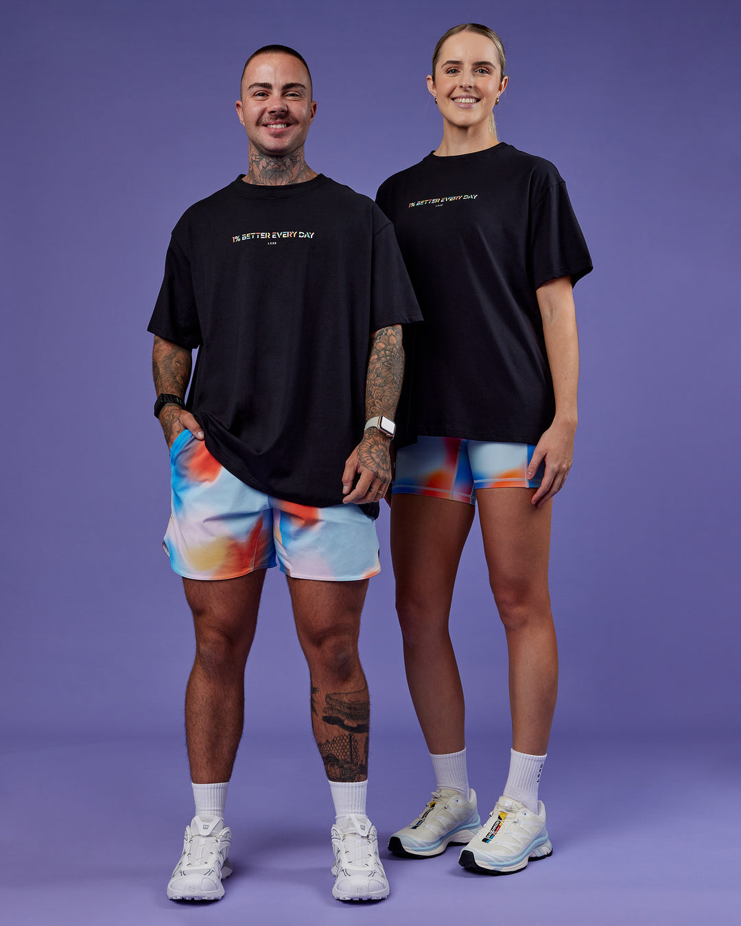 Duo wearing Unity Go-To FLX Cotton Tee - Black-Rainbow | Model:Both | Size:Duo