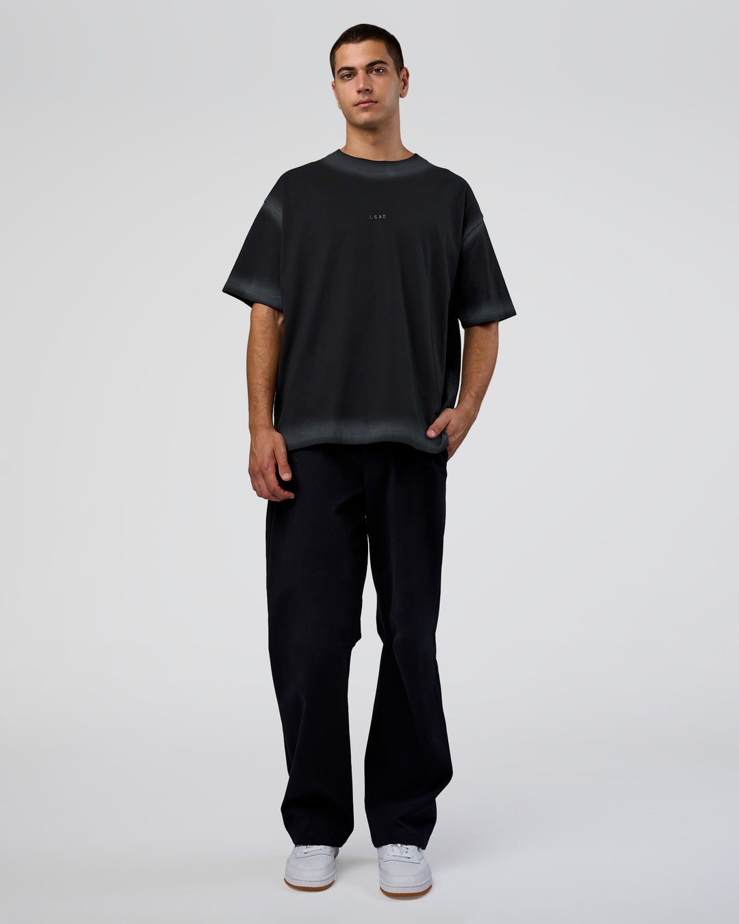 Man wearing Urban Blur Heavyweight Unisex Oversized Tee - Black-Dark Storm | Model:Zoran | Size:M