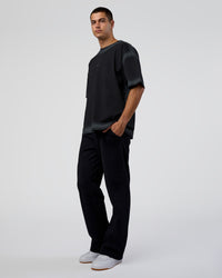 Man wearing Urban Blur Heavyweight Unisex Oversized Tee - Black-Dark Storm | Model:Zoran | Size:M
