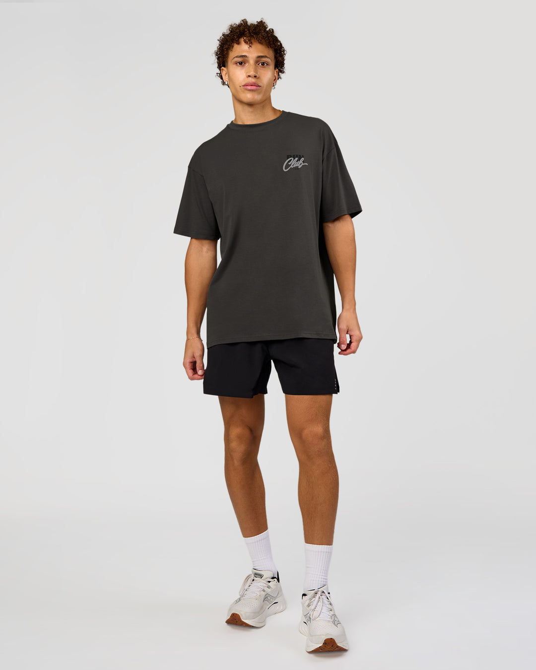Man wearing Values Run Club FLXCotton Tee - Dark Storm-Alloy | Model:Leandro | Size:M