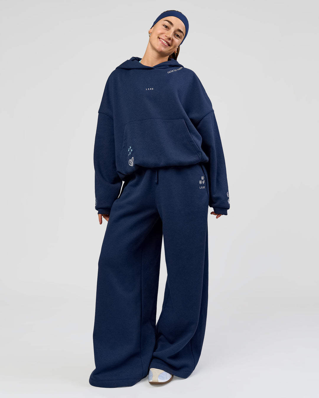 Woman wearing Zola Oversized Hoodie - Future Navy | Model:Grace | Size:M