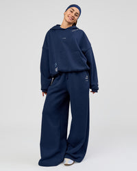 Woman wearing Zola Oversized Hoodie - Future Navy | Model:Grace | Size:M