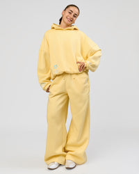 Woman wearing Zola Oversized Hoodie - Lemon | Model:Grace | Size:M