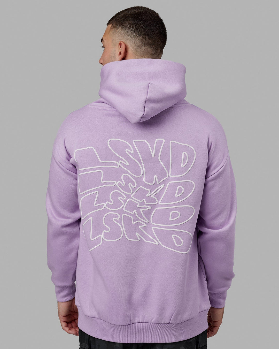 Man wearing Mad Happy Hoodie Oversize - Pale Lilac