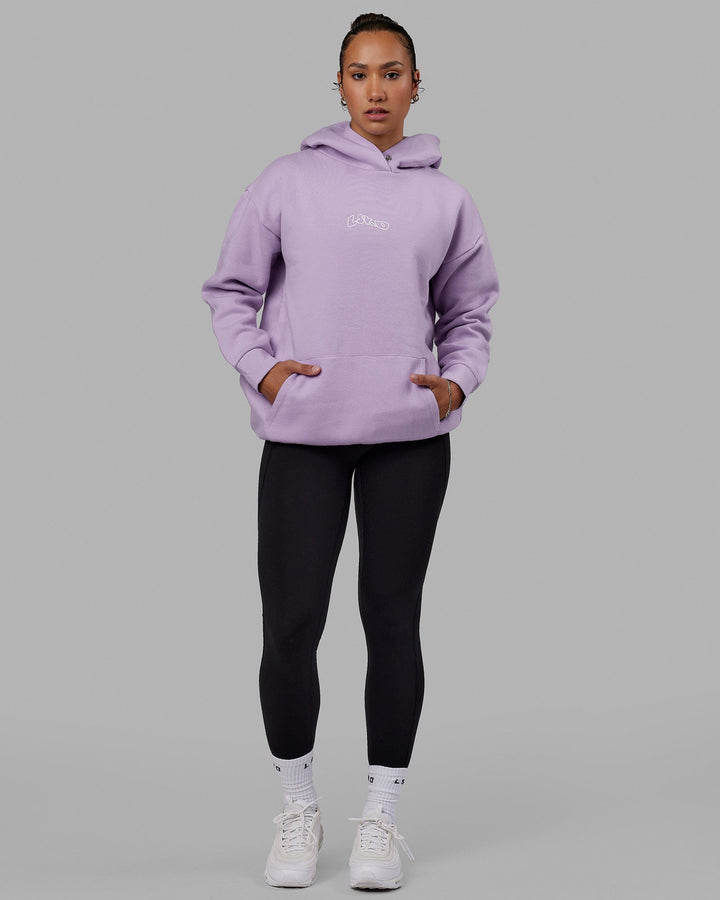 Woman wearing Mad Happy Hoodie Oversize - Pale Lilac