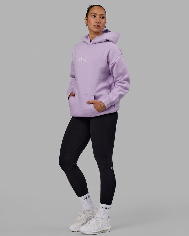 Woman wearing Mad Happy Hoodie Oversize - Pale Lilac