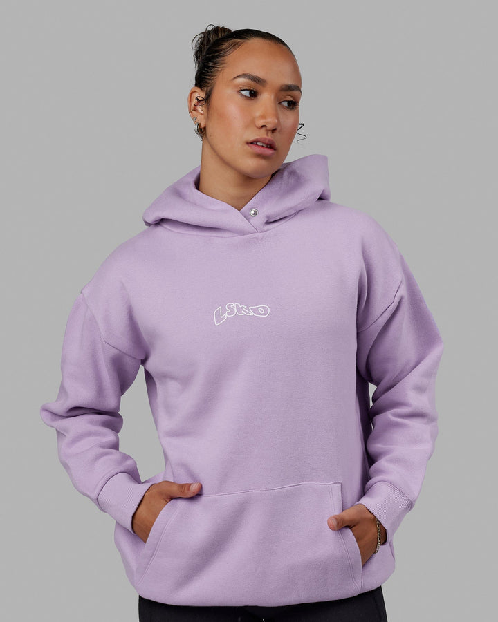 Woman wearing Mad Happy Hoodie Oversize - Pale Lilac