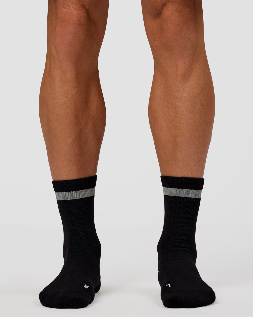 Man wearing Run Club Fast Performance Socks 2.0 - Black-Reflective