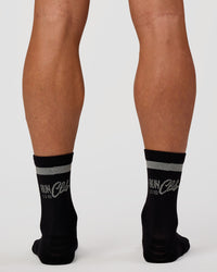 Man wearing Run Club Fast Performance Socks 2.0 - Black-Reflective