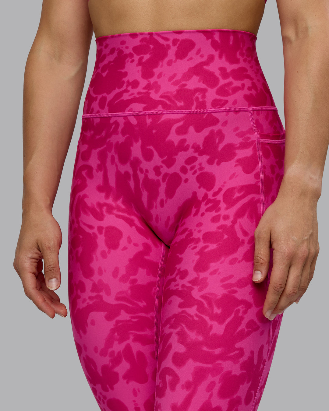 Woman wearing Fusion Ultra High-Rise Full Length Legging Pockets - Strawberry-Lava Lamp | Model:Zoe | Size:S
