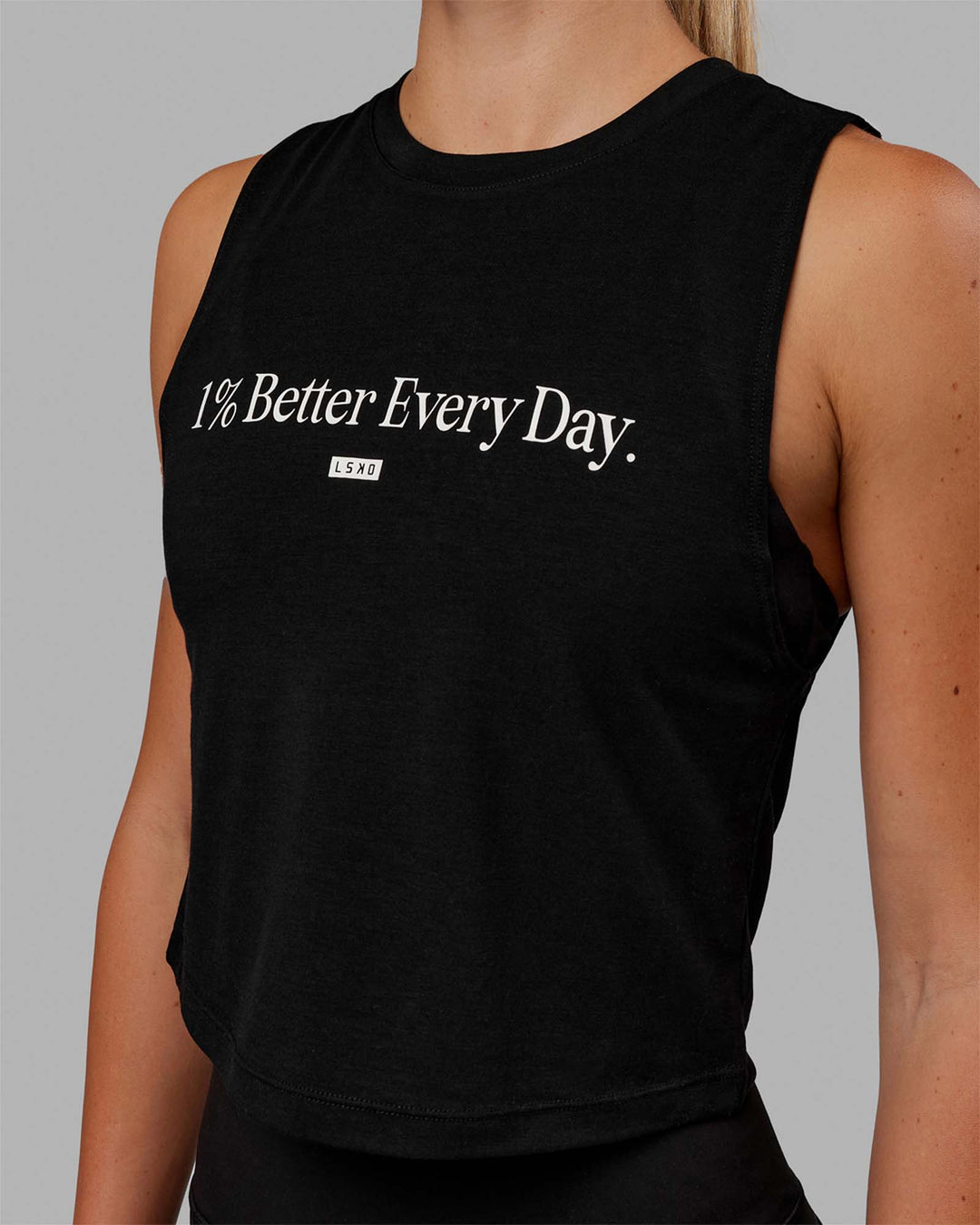 Woman wearing 1% Better Training Tank - Black-White