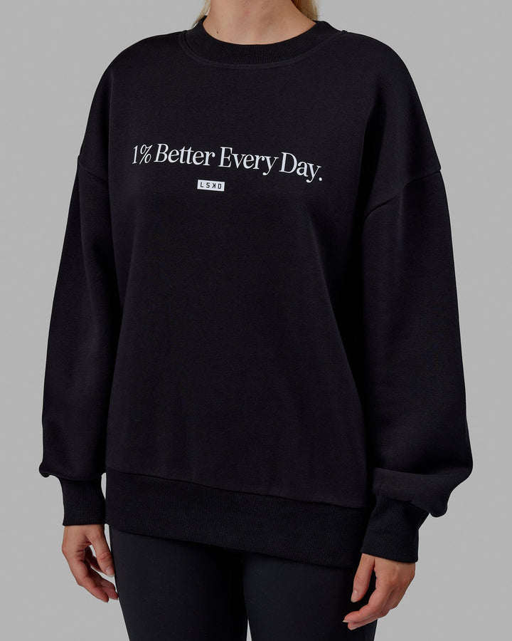 Woman wearing Unisex 1% Better Sweater Oversize - Black-White